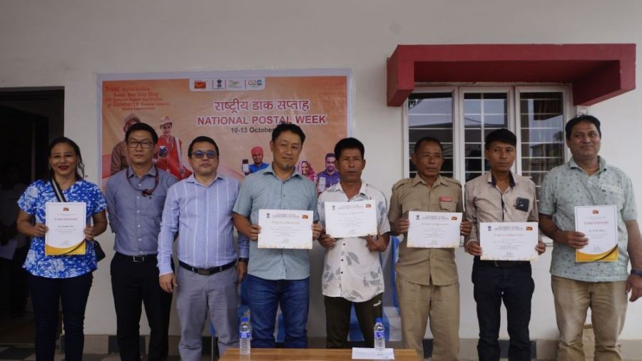 Som Kamei, IPoS, Postmaster General, North East–II with officials from different post offices in Nagaland who were felicitated for remarkable contribution and devotion to their duty. World Post Day was celebrated in Dimapur on October 9. (Morung Photo)